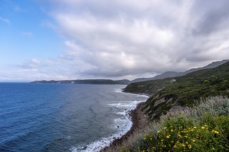 Sardinia, mountains, sea and coast, coastal landscape and blue sky with clouds, Villanova