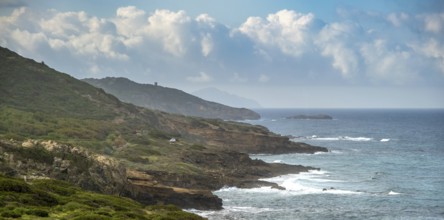 Sardinia, rugged coastal landscape by the sea, mountains, sea and more, blue sky with clouds,