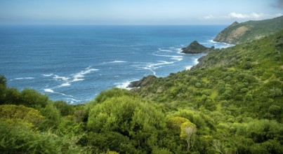 Sardinia, Mountainous coastal landscape by the sea, blue sky with clouds, Bosa, Europe, Province of
