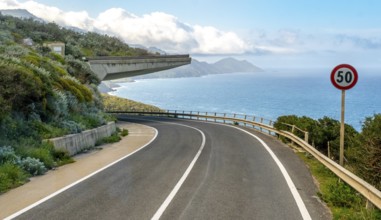 Sardinia, dreamlike coastal road by the sea, bridge projection, Villanova Monteleone, Europe,