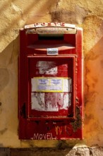 Sardinia, red letterbox on orange house wall, Bosa, Europe, Province of Oristano, Italy,