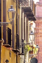 Sardinia, house wall with picturesque alleyway lamps, Bosa, Europe, Province of Oristano, Italy,