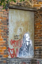 Grafitti with young woman, street scene, GdaÅsk, Gdansk, Baltic Sea coast, Baltic Sea, pomorskie,
