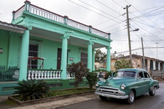 Vintage cars, old road cruisers in Vinales in the Vinales Valley, Cuba, Vinales, Central America,