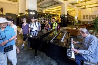 Hotel Amos Mundos, hotel of the writer Ernest Hamingway in Havana, lobby of the hotel with piano