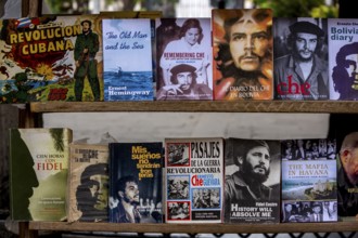 Second-hand bookshop, used books about Ernesto Che Guevara and Fidel Castro at the flea market in