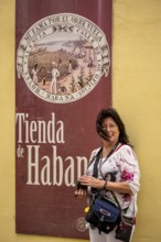 Tobacco poster in front of a Cuban cigar shop, La Habana, Cuba, Caribbean, Central America, Cuba,