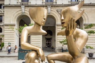 Golden art figures on the Plaza de San Francisco in the old town of Cuba, artist Etienne La