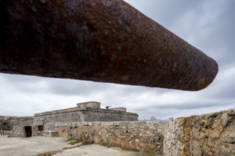 View from the Old Fort Haban Fuerte del Morro under an old cannon to Old Havana, Havana, La Habana,