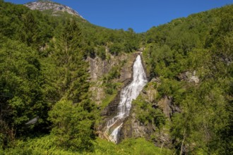Waterfall near Stahlheim, mountains, baür sky, Skulestadmo, Hordaland, Norway, Scandinavia, Europe,