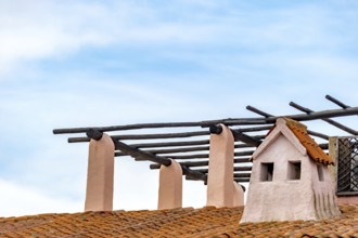 Sardinia, worth seeing harbour town Porto Cervo, roof construction wooden frame on roof with turret