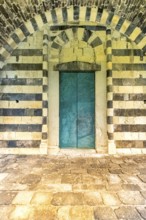 Sardinia, Santissima TrinitÃƒÆ'Ã'Â di Saccargia, Romanesque church with entrance door,