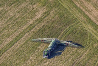 Aerial view, Tractor and agricultural spraying machine on a field, Paradiese, Soest, Soester Börde,
