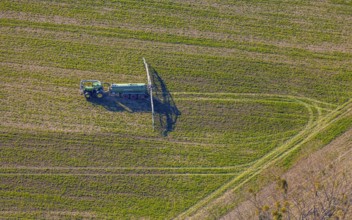 Aerial view, Tractor and agricultural spraying machine on a field, Paradiese, Soest, Soester Börde,