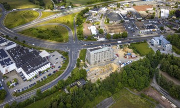 Aerial view, construction site with new hotel building on the corner of Flandersbacher Weg and