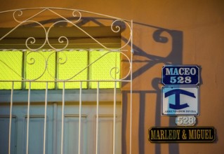 Street signs with the indication of a private accommodation for tourists of a Casa Paricular,
