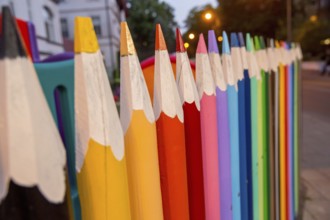 Large pencils as fence, kindergarten, ÅšwinoujÅ'cie, Swinoujscie, Baltic Sea coast, Baltic Sea,
