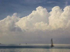 Sailboat with wall of clouds on the beach of Varadero, Cuba, Matanzas, Cuba, Central America