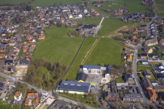 Aerial view, meadow area and planned building area between Hof Northoff and catholic Lambertischule