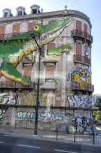 Painted facade with a crocodile of a house in Lisbon, Lisbon, Lisbon, Portugal