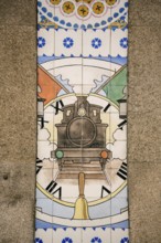 Azulejos tiles depict a steam locomotive with clock, Sao Bento railway station, Oporto, Porto