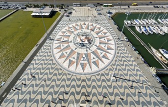 The large compass in the wave pavement in front of the Monumento a Los Descubrimientos, Lisbon,