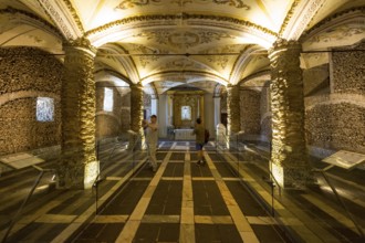 Piled bones in the ossuary, Capela dos ossos parede, chapel of bones, bone chapel, ossuary in