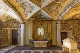 Piled bones in the ossuary, Capela dos ossos parede, chapel of bones, bone chapel, ossuary in