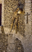 Piled bones in the ossuary, Capela dos ossos parede, chapel of bones, bone chapel, ossuary in