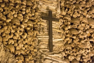 Piled bones in the ossuary, Capela dos ossos parede, chapel of bones, bone chapel, ossuary in