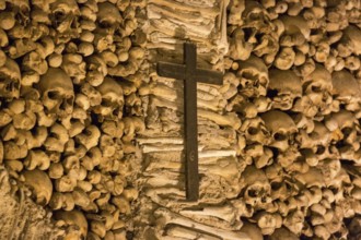Piled bones in the ossuary, Capela dos ossos parede, chapel of bones, bone chapel, ossuary in