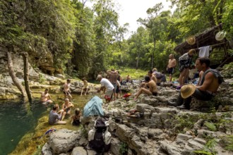 Small bathing lake in the Valle de los Ingenios with tourists, Trinidad, Cuba, Sancti Spíritus,