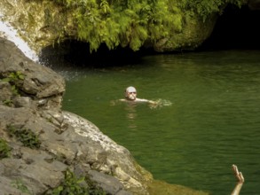 Small bathing lake in the Valle de los Ingenios with tourists, Trinidad, Cuba, Sancti Spíritus,