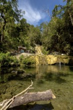 Small bathing lake in the Valle de los Ingenios with tourists, Trinidad, Cuba, Sancti Spíritus,