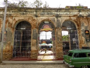 Entrance gate to a restaurant in the historic centre of Trinidad, Trinidad, Cuba, Sancti Spíritus,