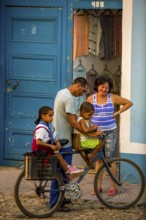 Street scene with children and bicycle in the old town of Trinidad, Trinidad, Cuba, Sancti