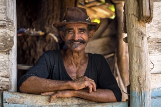 Sugar cane farmer in Valle de los Ingenios, portrait with hat, Trinidad, Cuba, Sancti Spíritus,
