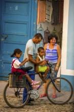 Street scene with children and bicycle in the old town of Trinidad, Trinidad, Cuba, Sancti