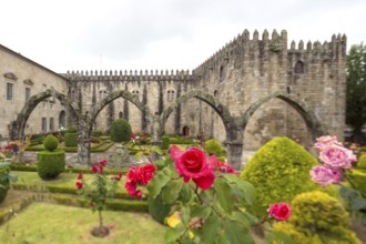 Jardim de Santa Barbara adjoins the crenellated façade of Antigo Paco Episcopal, former