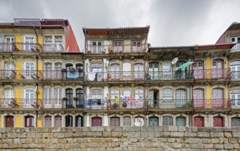 Colourful houses on the banks of the Douro in the Ribeira district, doors, Oporto, Porto district,
