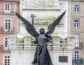 Angel figure in front of the stock exchange palace Palácio da Bolsa, Oporto, Porto district,