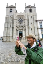 Pilgrims from Brazil photographed in front of the cathedral, Da Sé Cathedral, Barredo