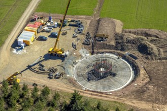 Aerial view, construction site with construction crane for wind turbine wind power plant at
