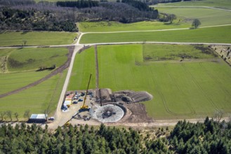 Aerial view, construction site with construction crane for wind turbine wind power plant at