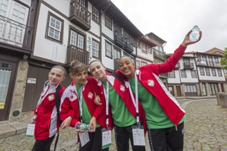 Young sportswomen in the historic centre of Guimaraes, Guimaraes, Braga district, Portugal, Europe,