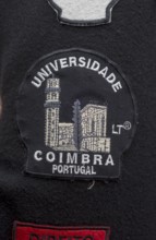 Stickers with different meanings on the capes of the students of Coimbra, University of Coimbra,