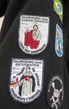 Stickers with different meanings on the capes of the students of Coimbra, University of Coimbra,