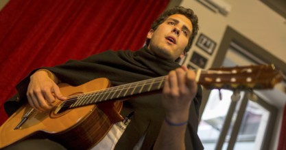 Fado singer in a cultural centre, Coimbra, Coimbra district, Portugal, Europe, aerial view,
