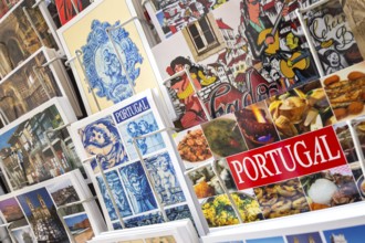 Postcards of Coimbra at a postcard stand, Miranda do Corvo, Coimbra district, Portugal, Europe,
