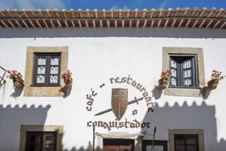 Picturesque facades with primroses and flower pots, picturesque small town Obidos, Ãbidos, district